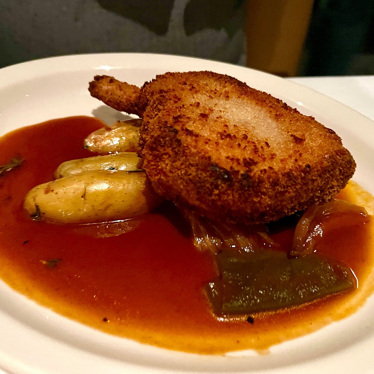 Prezza signature dishes Wood Grilled Pork ChopCrispy DuckRavioli di Uovo